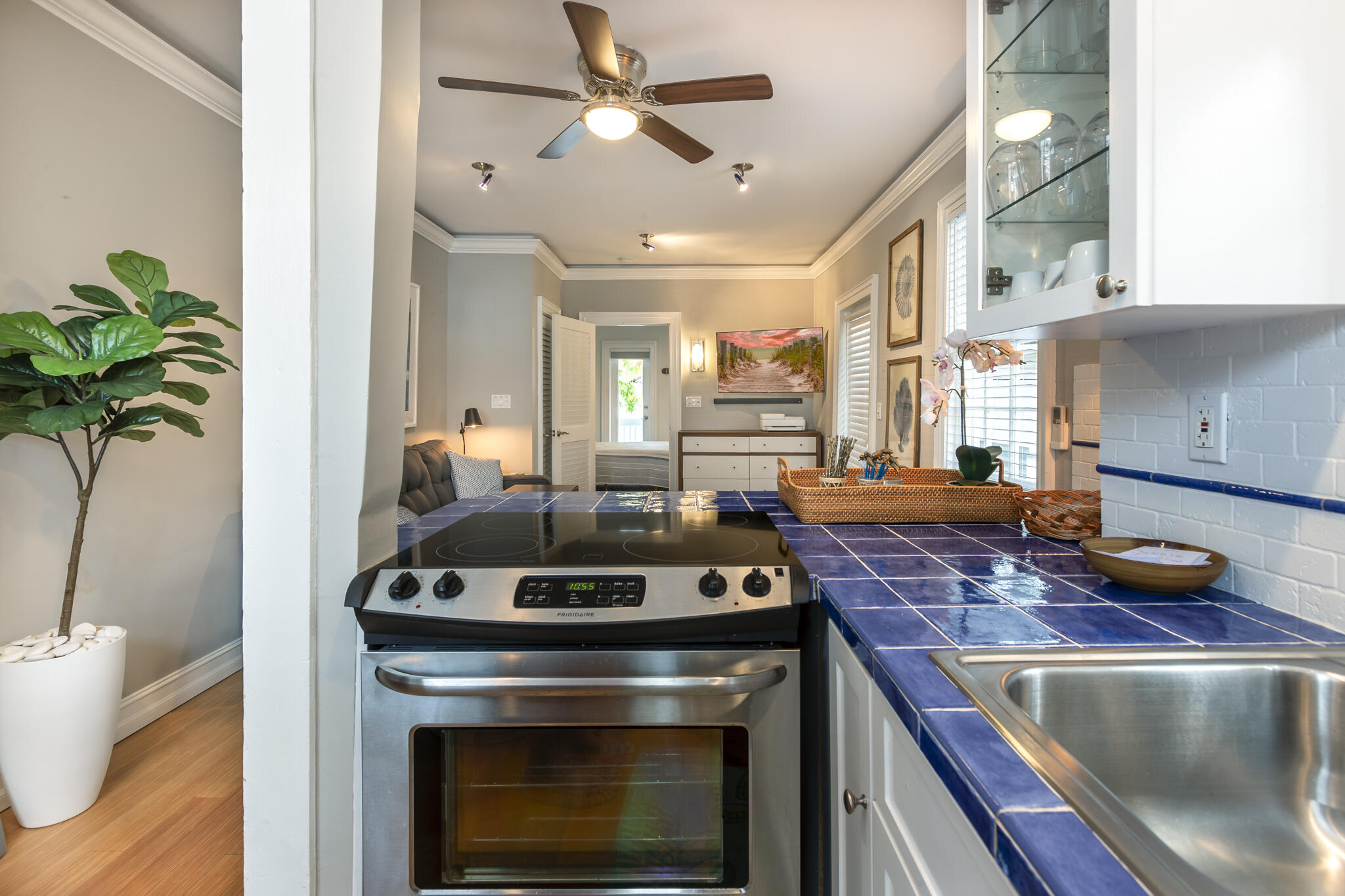 815 Pearl Street, Unit 2 Key West, FL 33040 - Photo 14 of 27 a kitchen with a stove and a potted plant