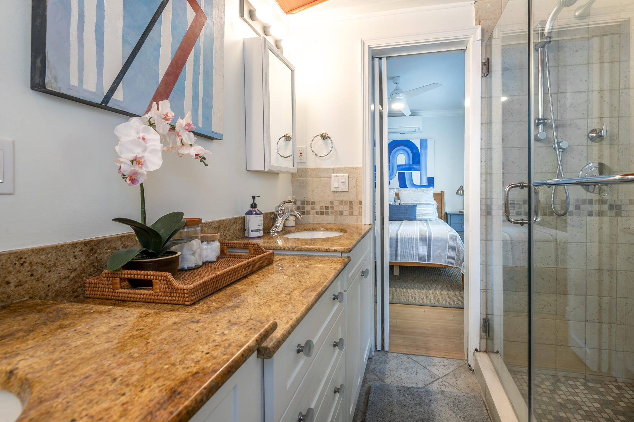 815 Pearl Street, Unit 2 Key West, FL 33040 - Photo 7 of 27 a bathroom with a granite countertop sink a mirror and shower