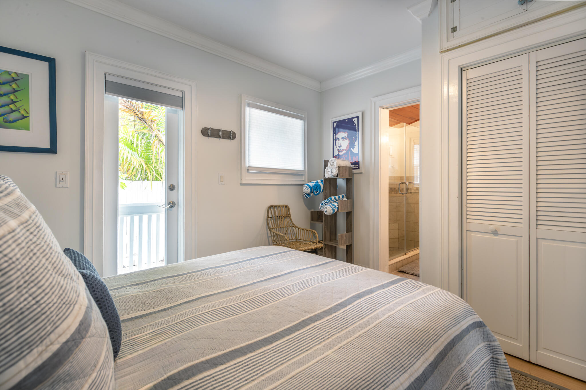 815 Pearl Street, Unit 2 Key West, FL 33040 - Photo 9 of 27 a bedroom with a bed and a window