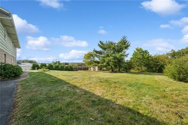 a house view with a garden space