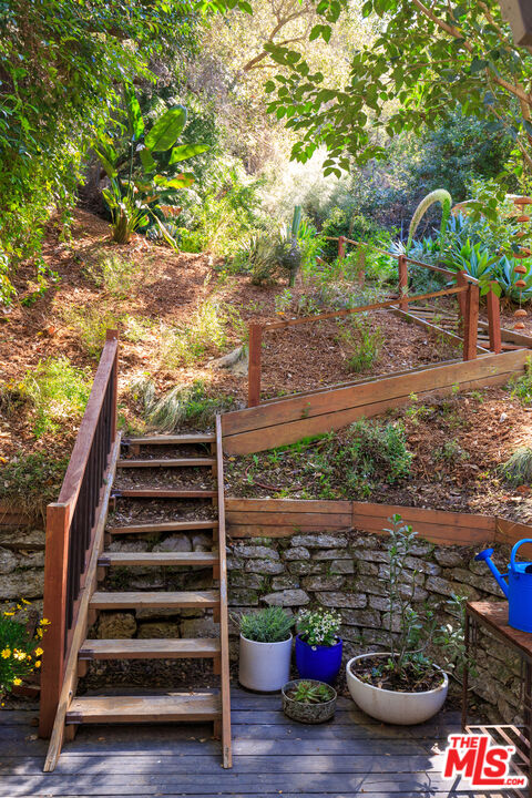 1320 Gates Place South Pasadena, CA 91030 - Photo 19 of 22 a view of a backyard with sitting area and plants