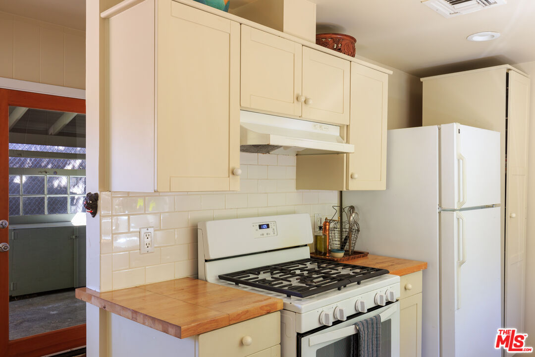 1320 Gates Place South Pasadena, CA 91030 - Photo 7 of 22 a kitchen with appliances a counter space and a window