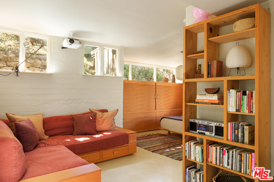 1320 Gates Place South Pasadena, CA 91030 - Photo 9 of 22 a living room with furniture and a book shelf