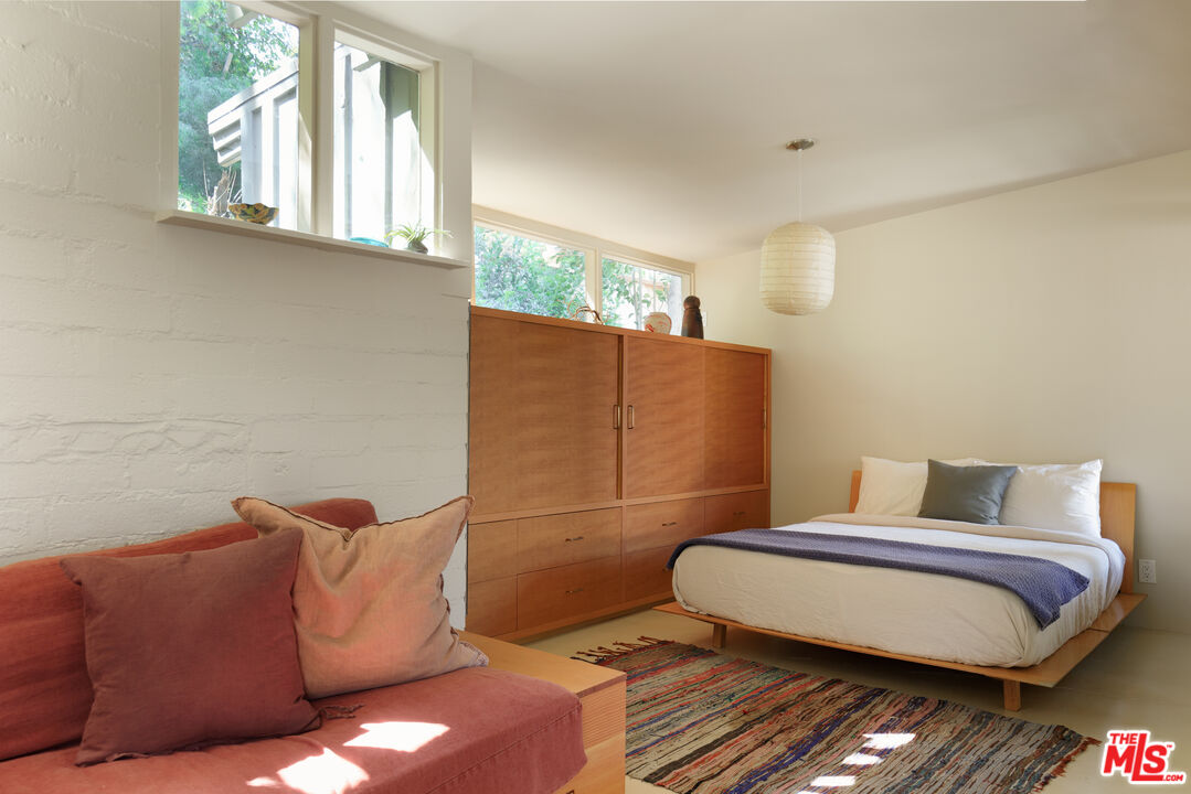 1320 Gates Place South Pasadena, CA 91030 - Photo 10 of 22 a bedroom with a bed and wooden floor