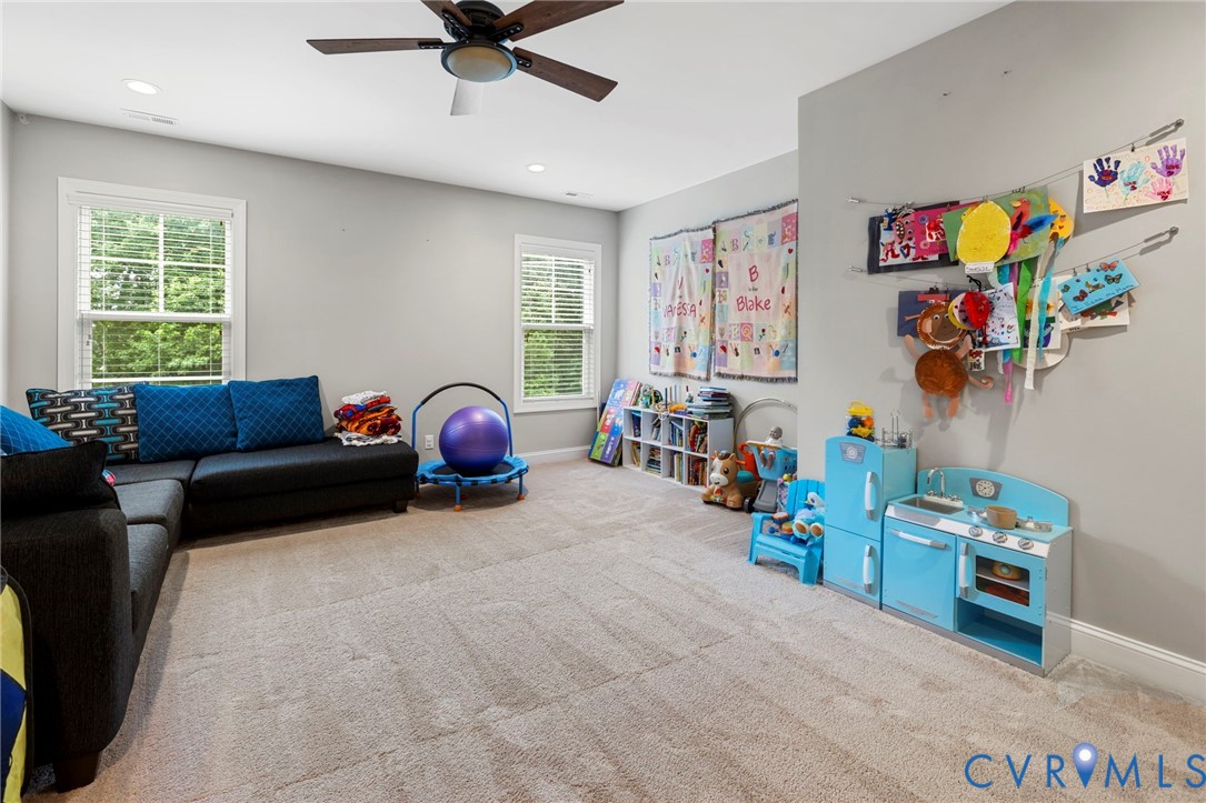 16507 Hannington Drive Midlothian, VA 23112 - Photo 28 of 43 a living room with furniture toys and a window