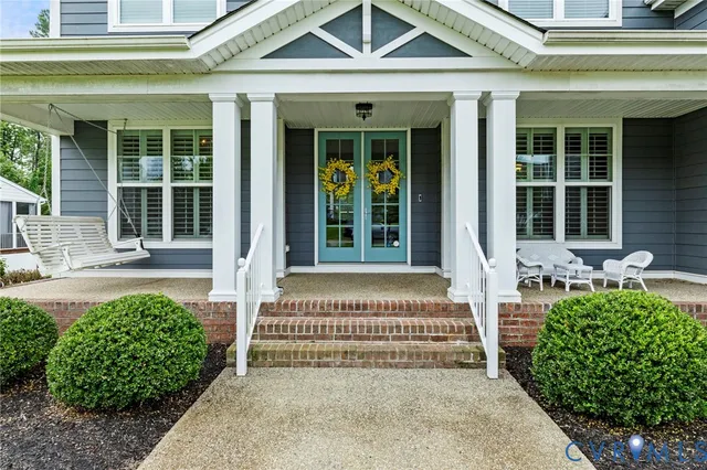 a front view of a house with a porch