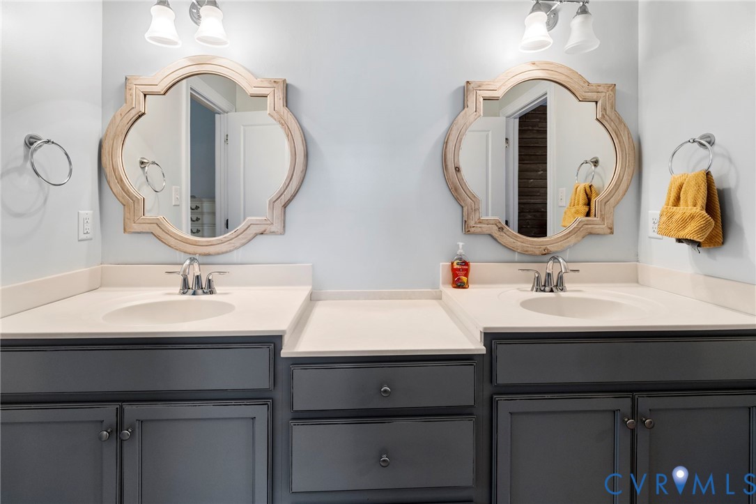 16507 Hannington Drive Midlothian, VA 23112 - Photo 32 of 43 a bathroom with a sink and a mirror