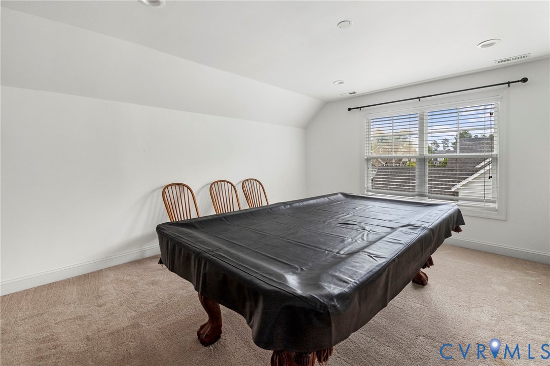 16507 Hannington Drive Midlothian, VA 23112 - Photo 34 of 43 a room with a table chairs and wooden floor