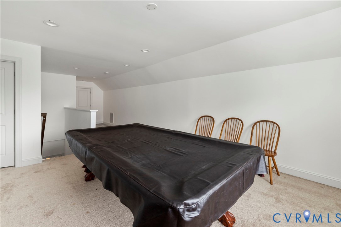 16507 Hannington Drive Midlothian, VA 23112 - Photo 35 of 43 a kitchen with a table chairs and a refrigerator