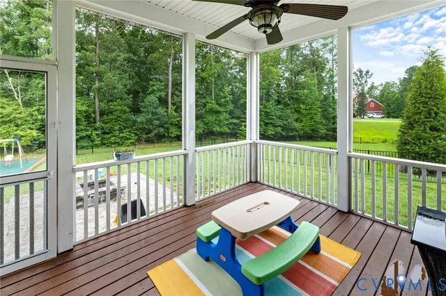 a view of a backyard with swimming pool