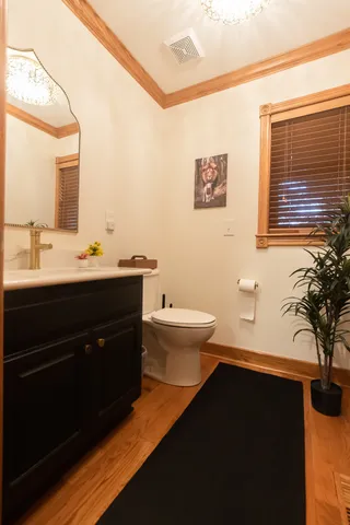 a kitchen with sink and cabinets