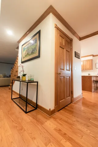 a view of a kitchen with a sink and dishwasher next to a window