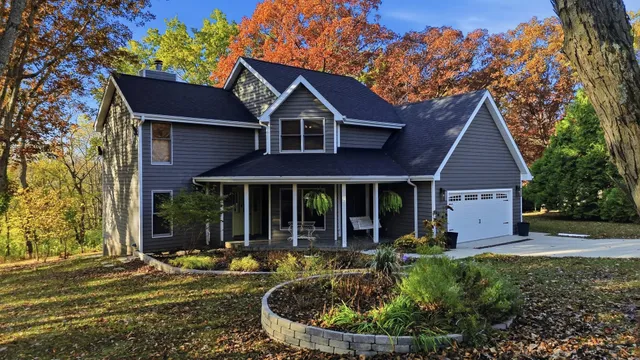 front view of a house with a yard