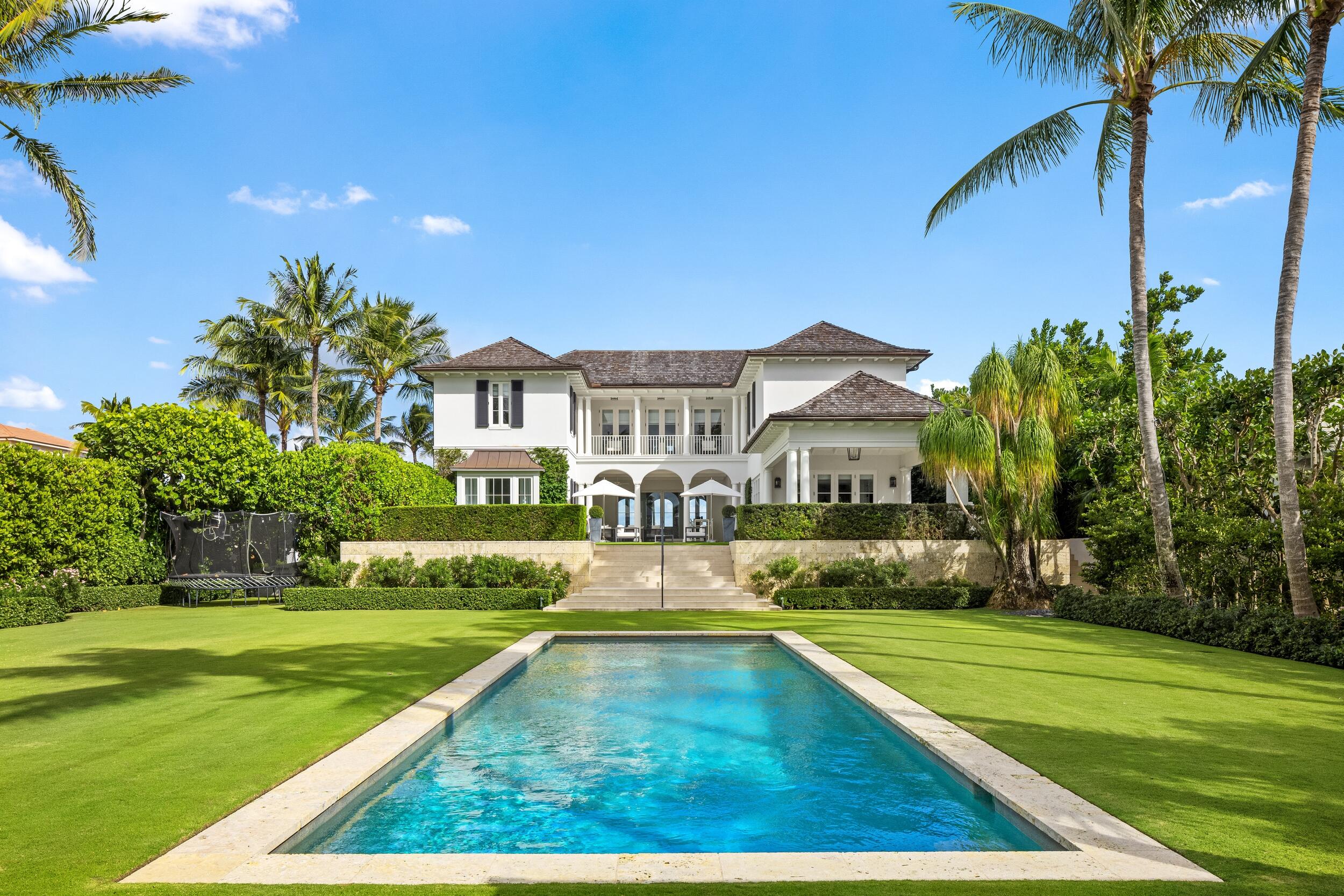 102 Reef Road Palm Beach, FL 33480 - Photo 19 of 22 a view of house with yard and swimming pool
