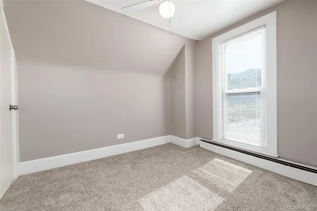 a bathroom with a sink toilet vanity and bathtub