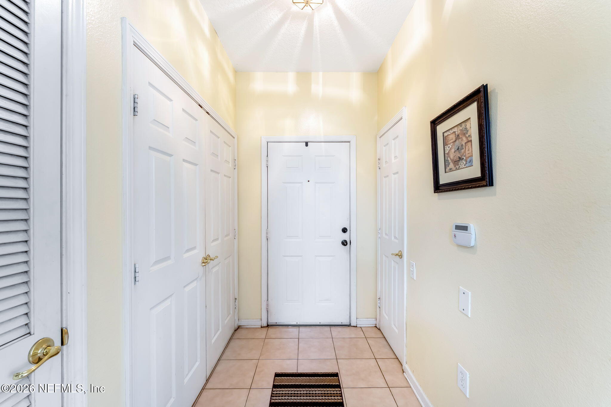 7990 Baymeadows Road East, Unit 416 Jacksonville, FL 32256 - Photo 3 of 32 3-web-or-mls-Entry Way