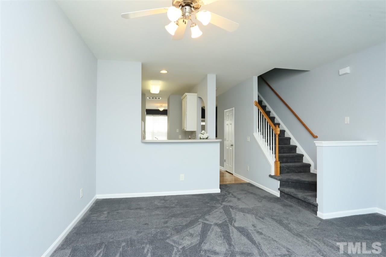 8454 Reedy Ridge Lane Raleigh, NC 27613 - Photo 12 of 30 a view of entryway and hall with wooden floor