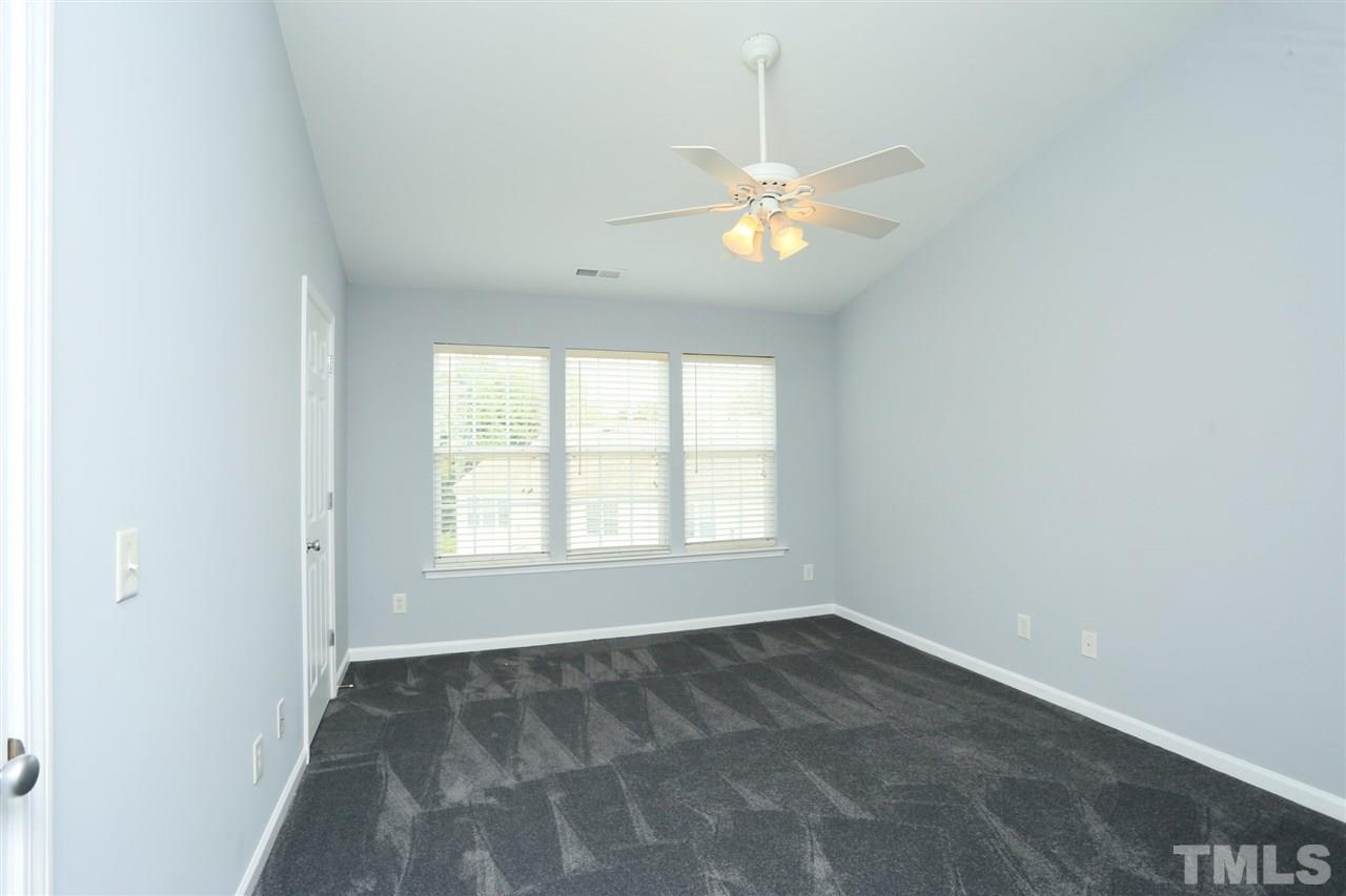 8454 Reedy Ridge Lane Raleigh, NC 27613 - Photo 17 of 30 an empty room with a window