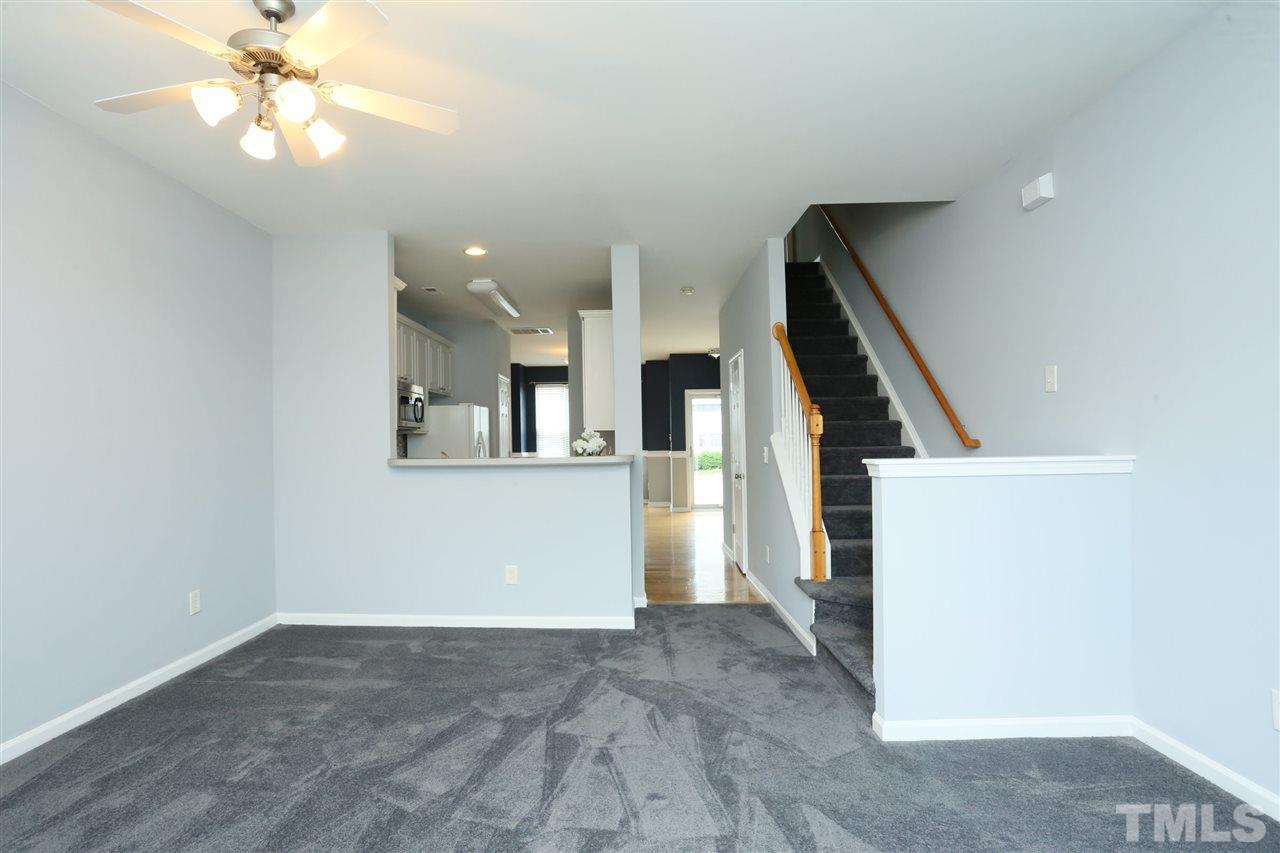 8454 Reedy Ridge Lane Raleigh, NC 27613 - Photo 10 of 30 wooden floor in an empty room with a window