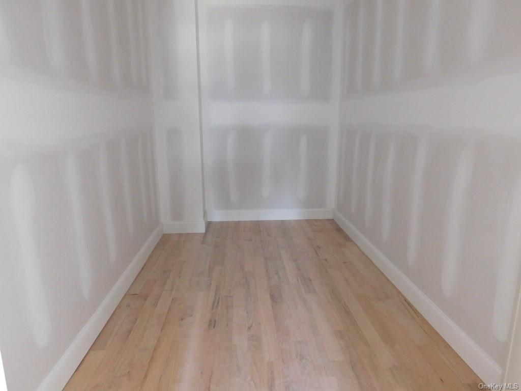 88 Quaker Street Wallkill, NY 12589 - Photo 13 of 24 a view of a room with wooden floor