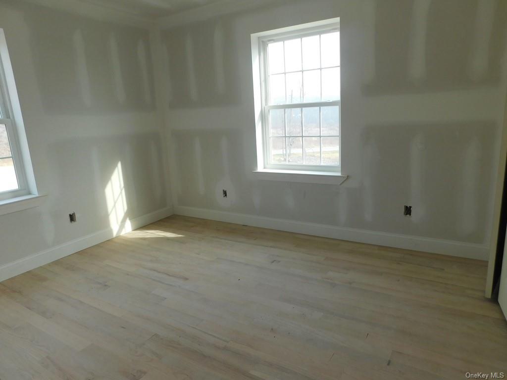 88 Quaker Street Wallkill, NY 12589 - Photo 14 of 24 an empty room with a window