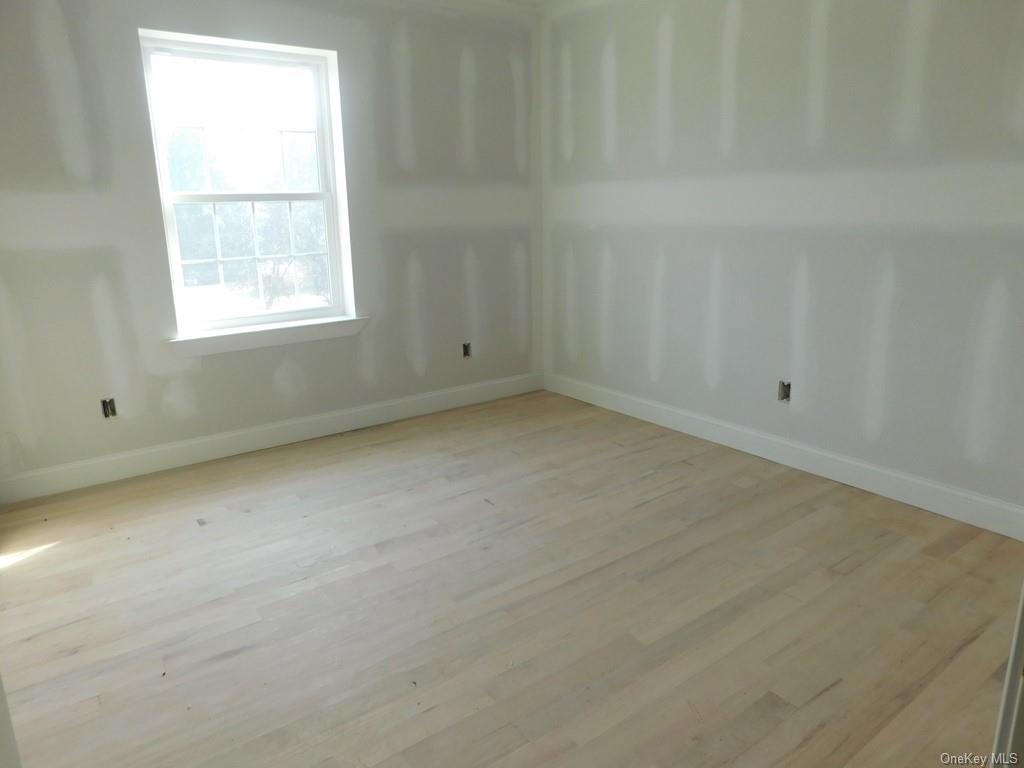 88 Quaker Street Wallkill, NY 12589 - Photo 15 of 24 an empty room with a window