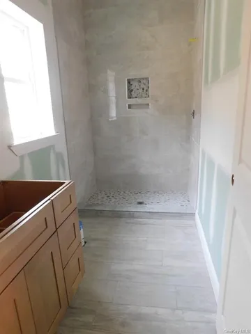a view of a bathroom with a shower