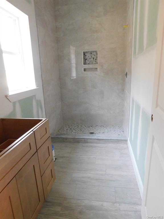 88 Quaker Street Wallkill, NY 12589 - Photo 20 of 24 a view of a bathroom with a shower