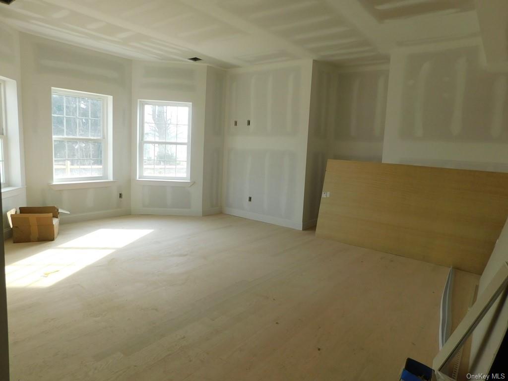 88 Quaker Street Wallkill, NY 12589 - Photo 22 of 24 an empty room with windows