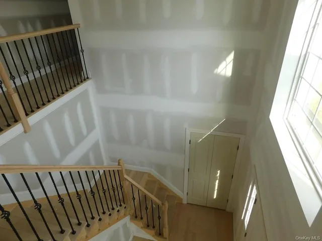 a view of balcony with wooden floor