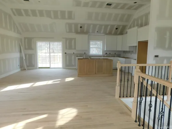 a view of kitchen with furniture and window