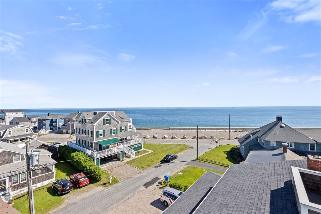 92 Marion Road, Unit LOWR Scituate, MA 02066 - Photo 12 of 18 an aerial view of a swimming pool with seating area