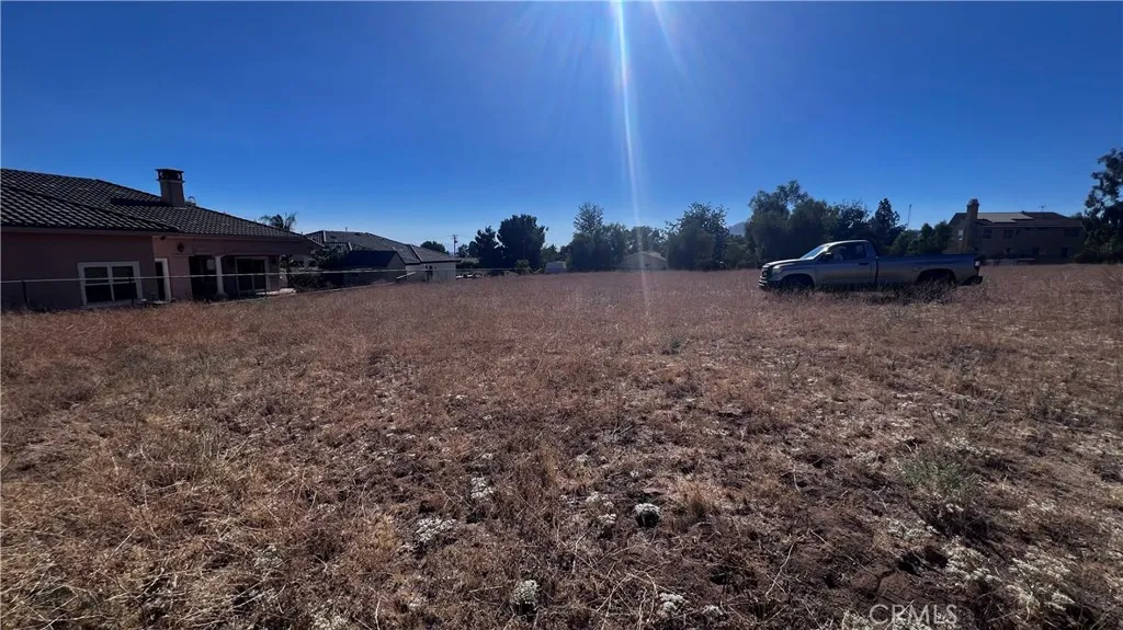 11560 Kitching Street Moreno Valley, CA 92557 - Photo 13 of 20 a view of a house with a yard