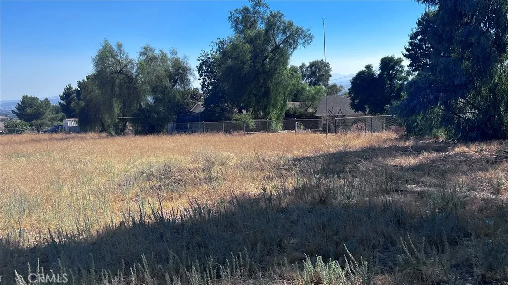 11560 Kitching Street Moreno Valley, CA 92557 - Photo 10 of 20 a view of empty yard with green space