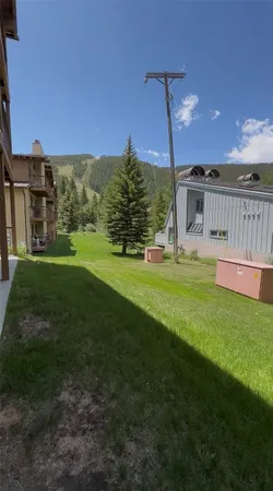 a view of a house with a big yard