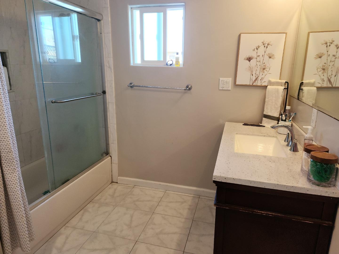 337 Reata Street Salinas, CA 93906 - Photo 8 of 11 a bathroom with a sink and mirror