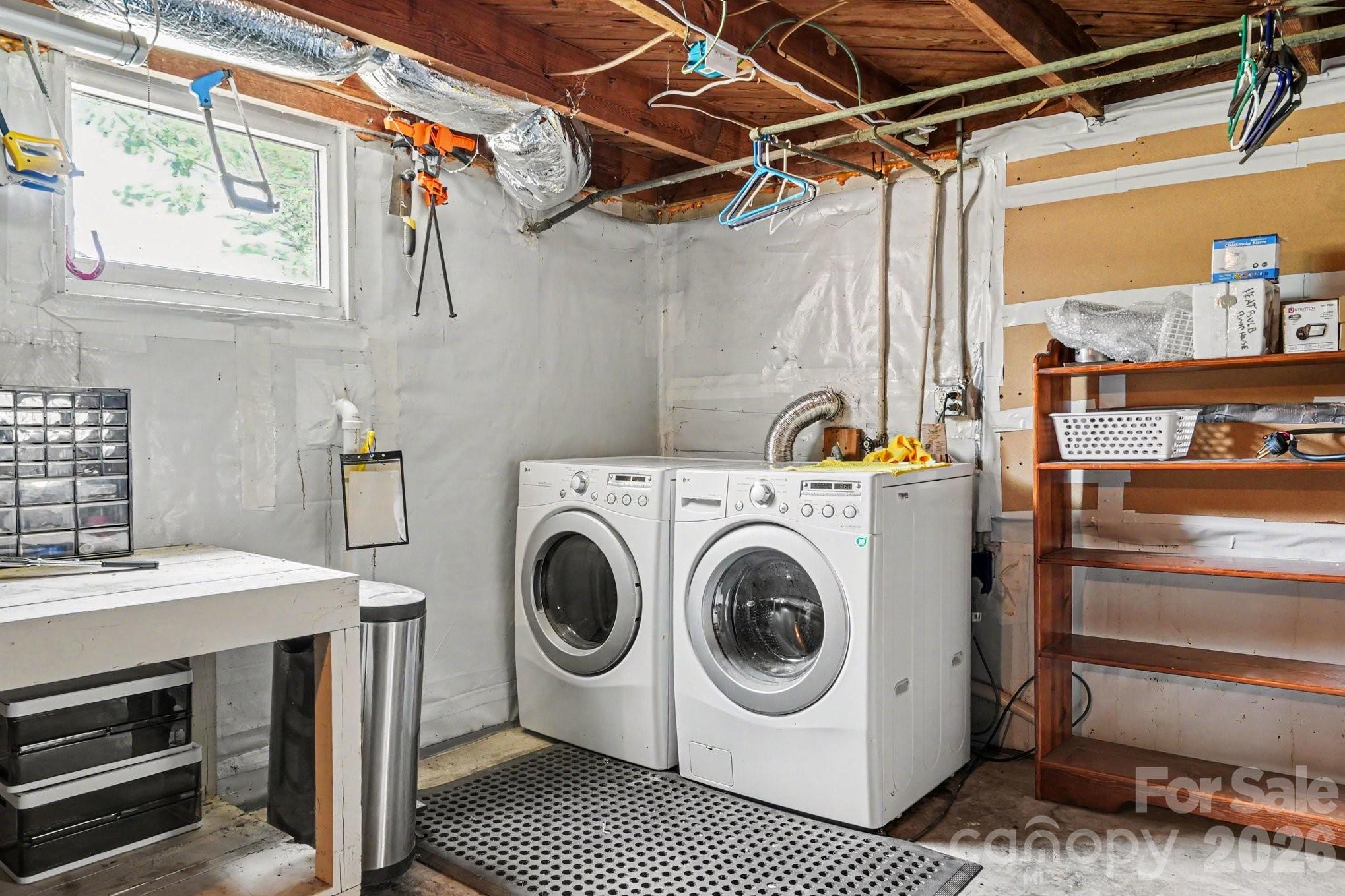 24359 Ridgecrest Road Locust, NC 28097 - Photo 19 of 26 a utility room with dryer and washer