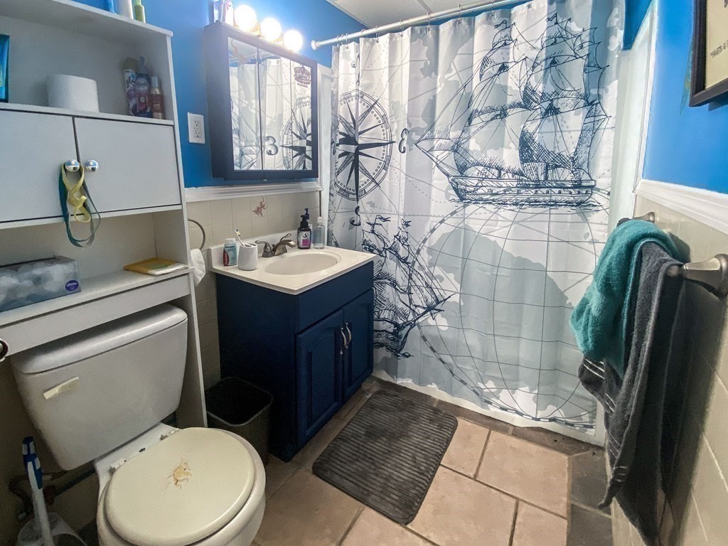 1141 Stafford Road Fall River, MA 02721 - Photo 20 of 30 a bathroom with a sink toilet and shower