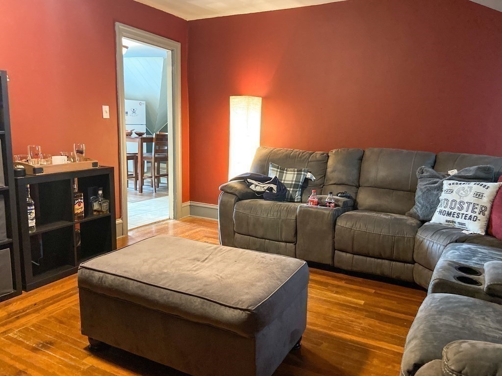 1141 Stafford Road Fall River, MA 02721 - Photo 21 of 30 a living room with furniture and a couch