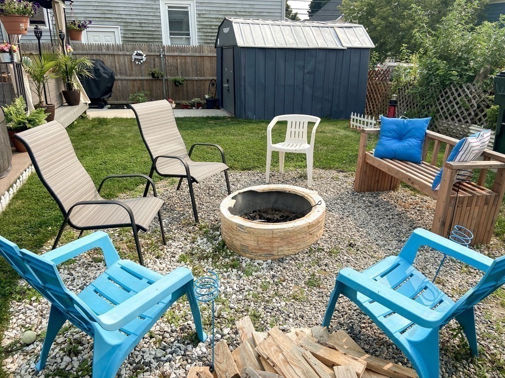 1141 Stafford Road Fall River, MA 02721 - Photo 26 of 30 a view of an outdoor sitting area in a backyard