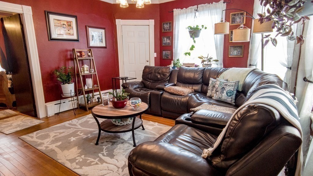 1141 Stafford Road Fall River, MA 02721 - Photo 7 of 30 a living room with furniture and wooden floor
