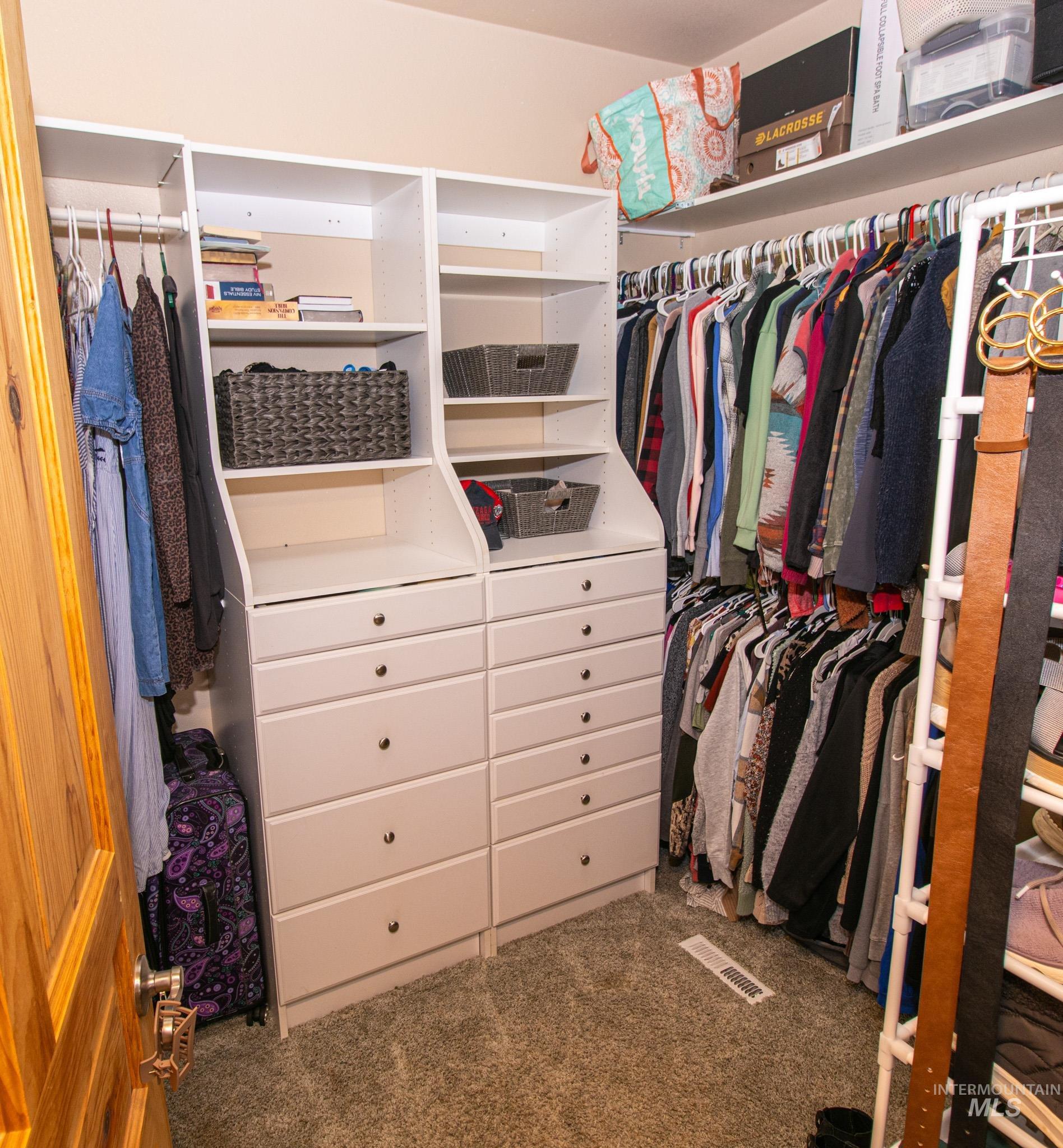 237 Old Dent Road Orofino, ID 83544 - Photo 20 of 48 Walk in closet with dark carpet
