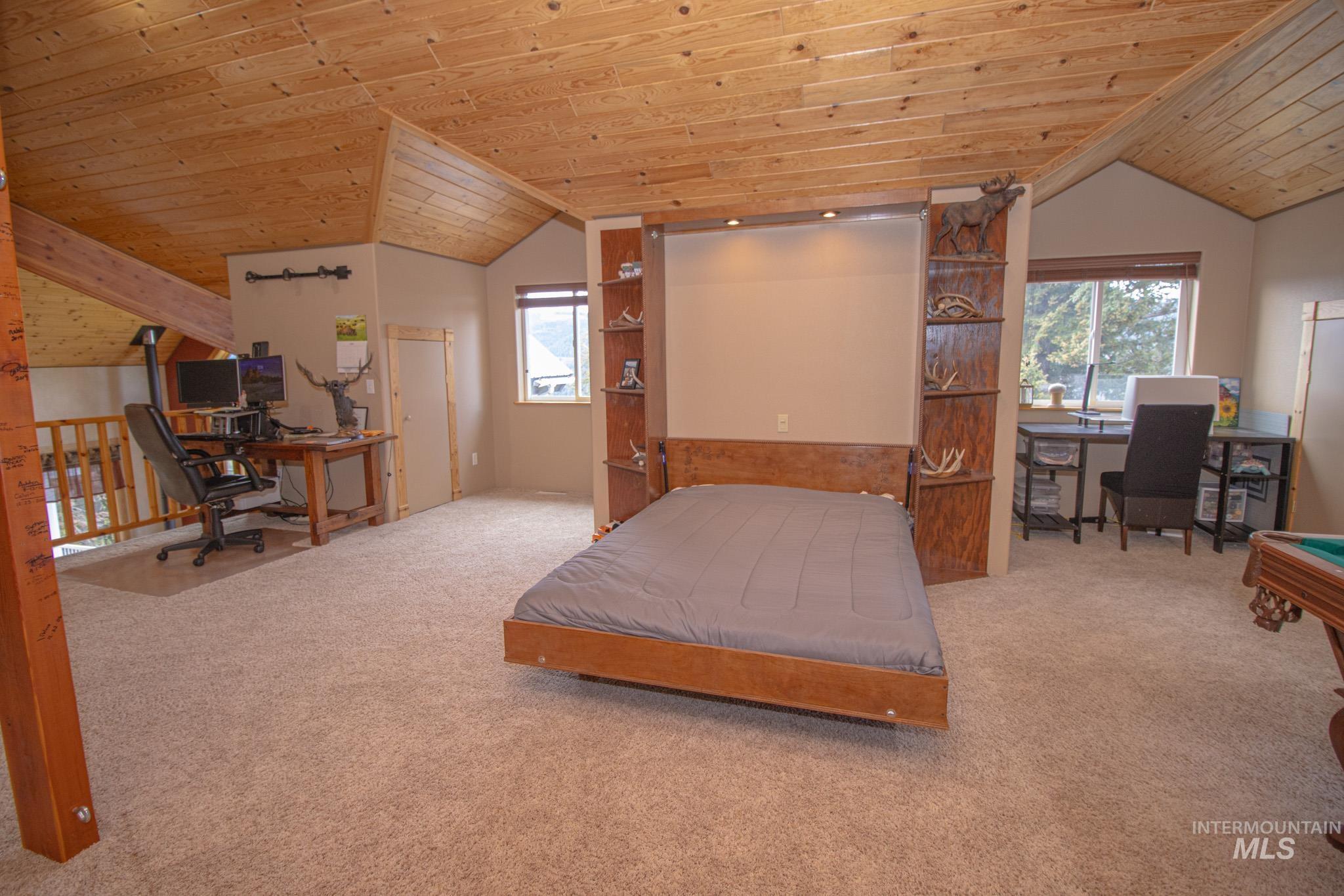 237 Old Dent Road Orofino, ID 83544 - Photo 31 of 48 Bedroom featuring a desk, a vaulted wood ceiling, carpet, and billiards