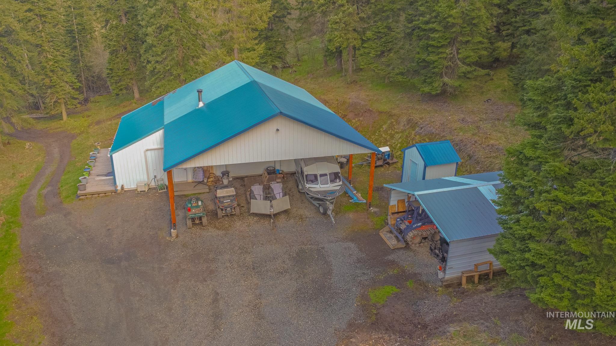 237 Old Dent Road Orofino, ID 83544 - Photo 33 of 48 Aerial view of property and surrounding area with a forest