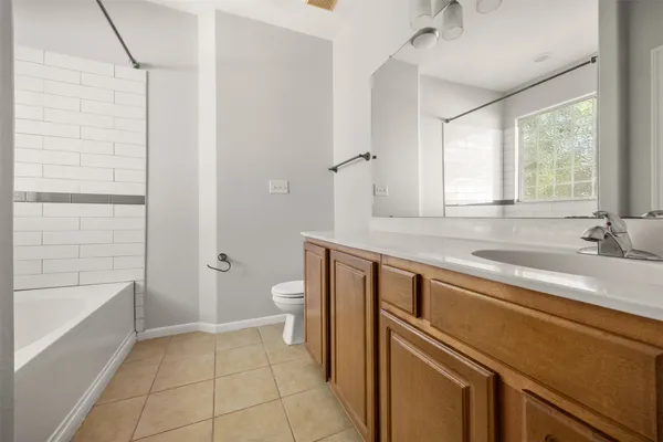 a view of a backyard with large trees