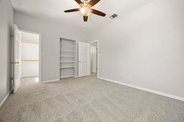 a view of a yard with a house