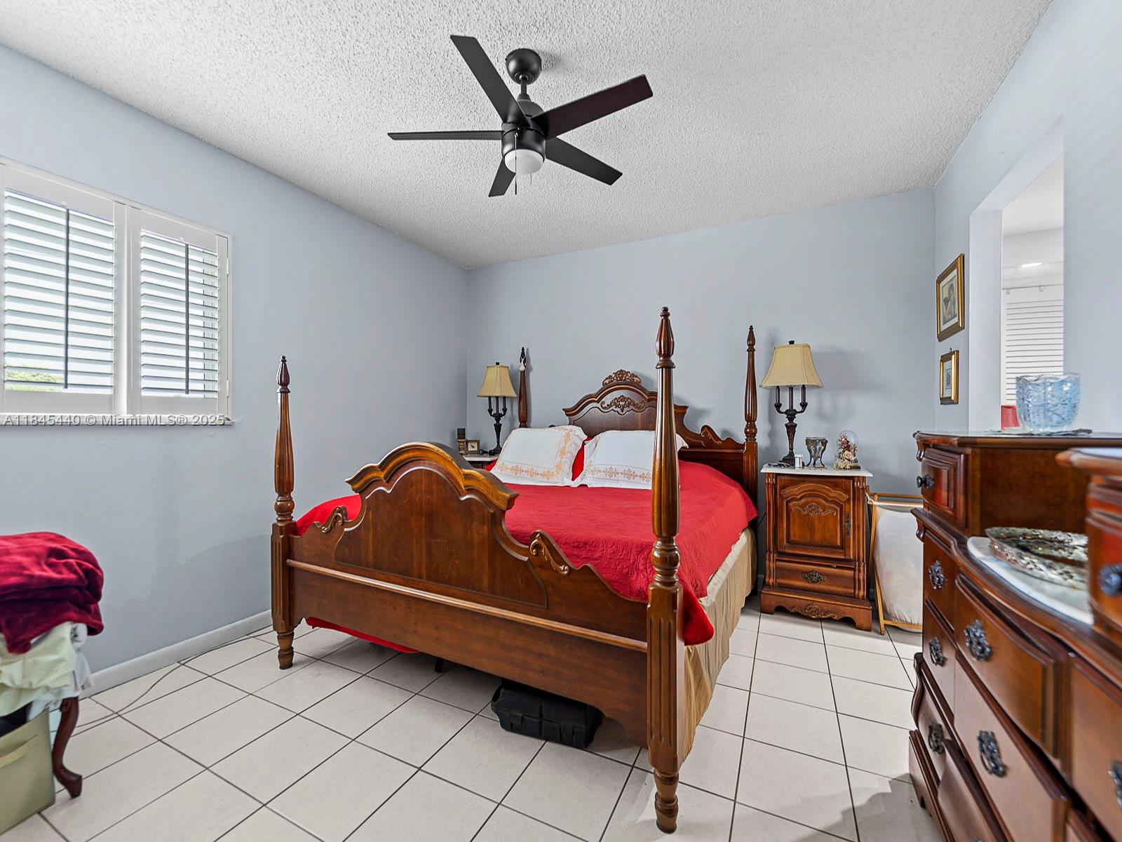 2690 Southwest 22nd Avenue, Unit 507 Miami, FL 33133 - Photo 11 of 20 a bed room with furniture and a window