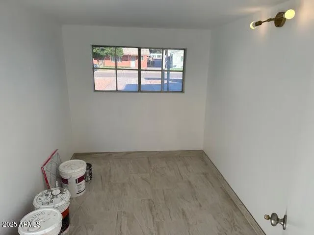 an empty room with windows