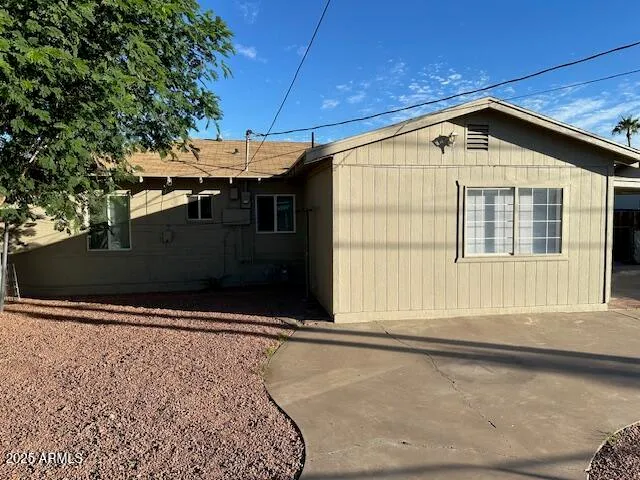 a view of house with yard