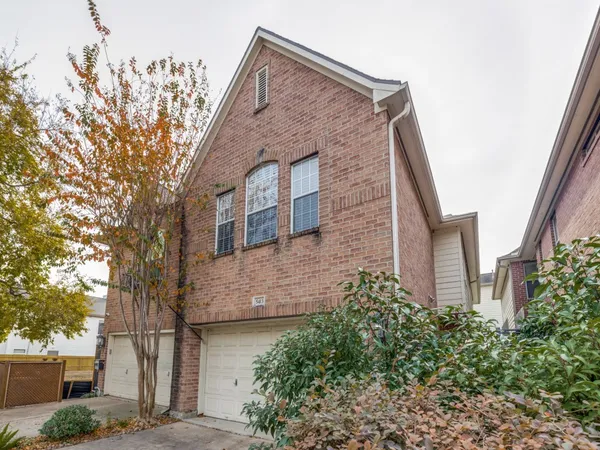 a brick building with a large windows